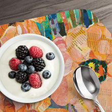 Load image into Gallery viewer, Counterart Reversible Wipe Clean Wedge Placemat Bold Blooms
