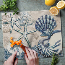 Load image into Gallery viewer, CounterArt Tide Pool Shells Tempered Glass Counter Saver Cutting Board 15&quot; x 12&quot; Made in the USA
