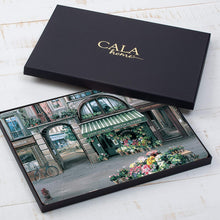 Load image into Gallery viewer, Village Square Hardboard Cork Back Table Mats Set of 4 by Cala Home
